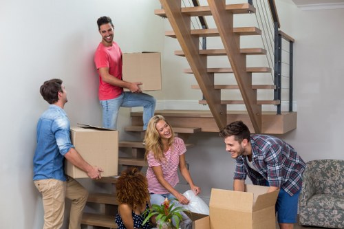 Removal van and packed boxes for a local move in Brent