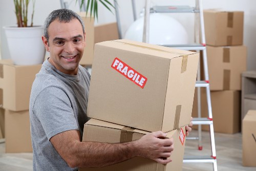 Office relocation team working in Brent near a commercial building