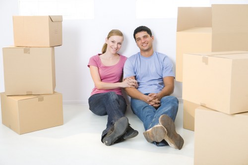 Office removal items and moving boxes ready for a business relocation in Brent