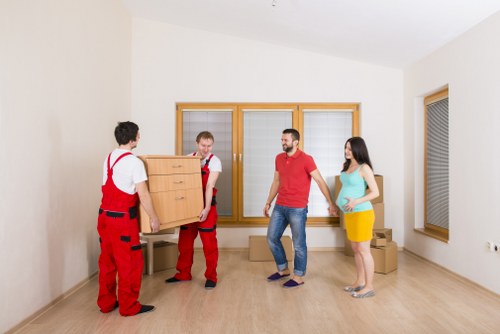 Careful loading of household furniture during a Brent removal