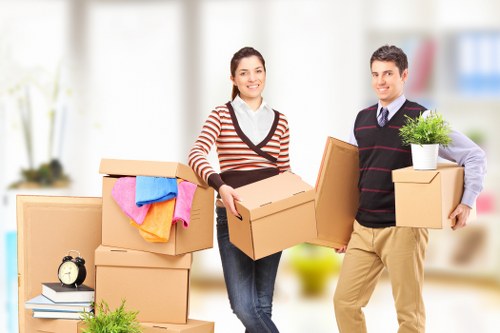 Relocation crew loading office furniture for a move in Brent