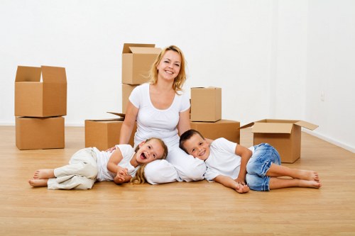 Professional Brent man with van handling furniture and household items carefully