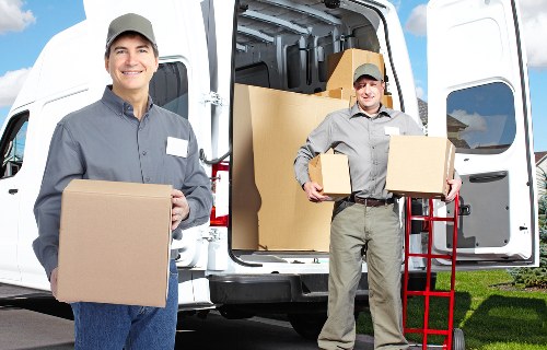 Team loading furniture for a Brent removal service