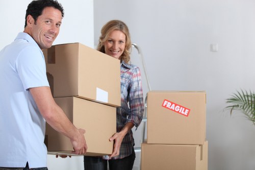 Professional man and van moving belongings in Brent