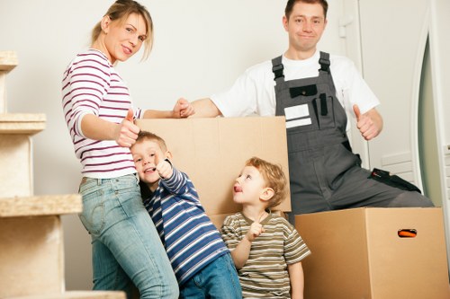 Loading furniture into a removal van for a Brent house move